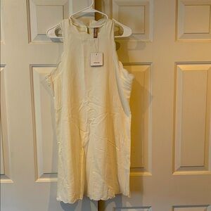 White cotton mini dress with ruffles